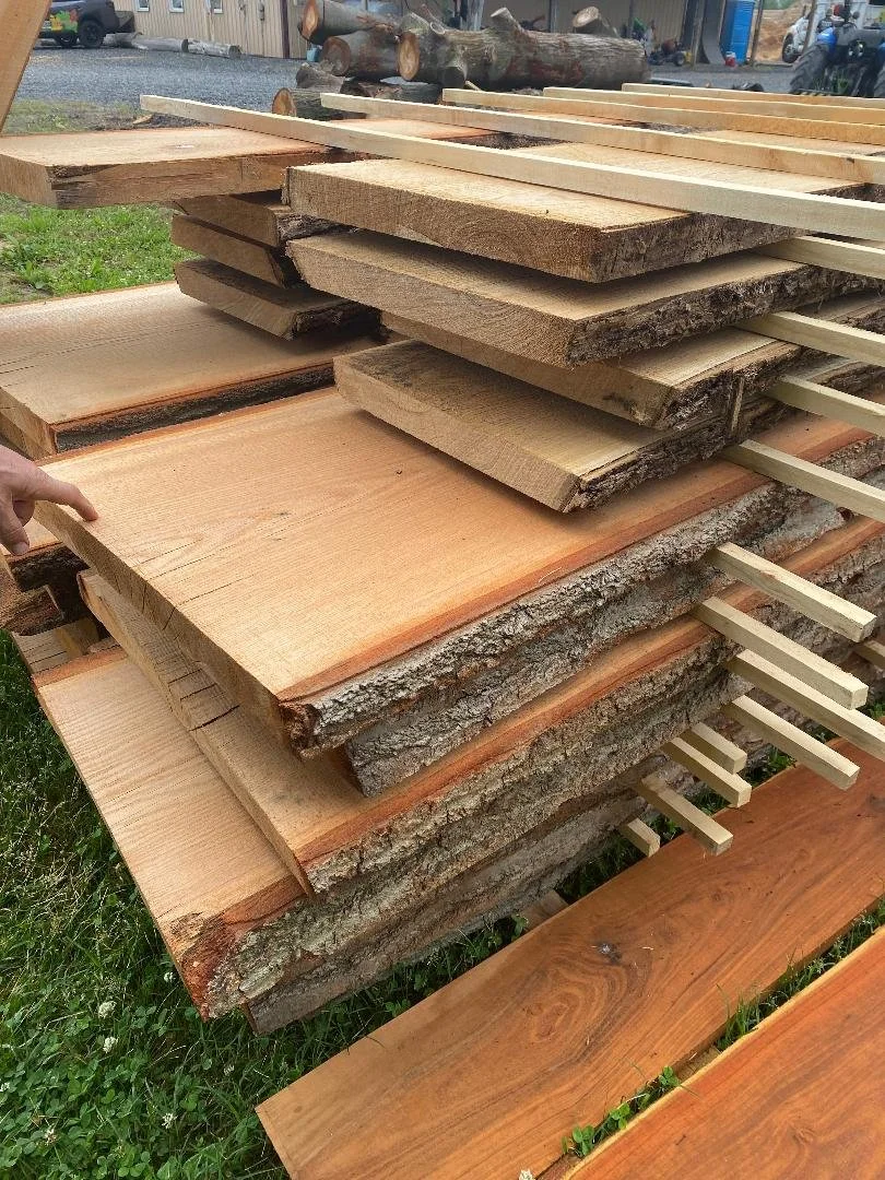 Mixed hardwood slabs stacked in the milling area